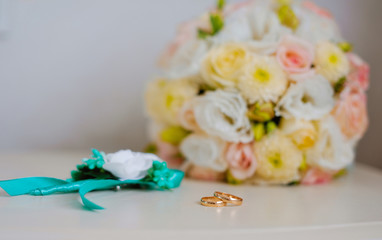 Wedding bouquet and rings