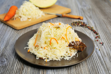 Sauerkraut with carrot in bowl