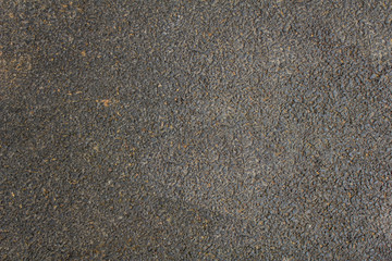 black gray asphalt closeup. rough surface texture