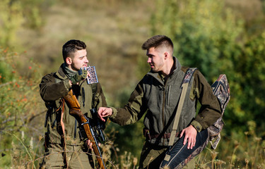 Army forces. Camouflage. Military uniform. Friendship of men hunters. Hunting skills & weapon...