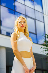 Fototapeta premium Blonde woman in city