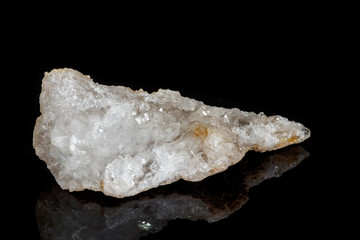 Macro mineral quartz snow stone on a black background