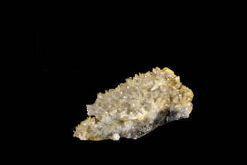 Macro mineral quartz stone on a black background