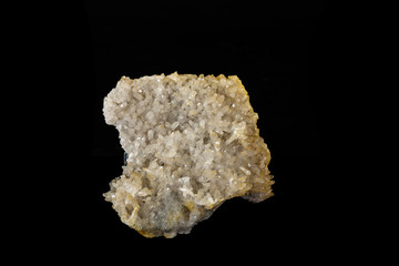 Macro mineral quartz stone on a black background