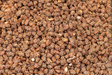 Peanut in sugar, background, texture
