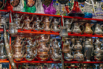 Fototapeta premium Copper and silver kettles in the market