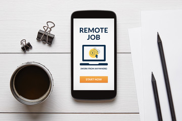 Remote job concept on smart phone screen with office objects