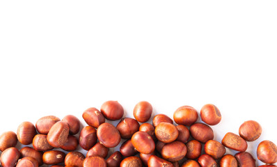 Closeup top view horse chestnuts isolated on white background,  healthy food concept
