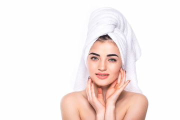 Spa skin care beauty woman wearing hair towel after beauty treatment. Beautiful young woman with perfect skin isolated on white background.