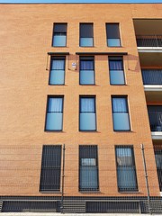facade of a brick building, windows