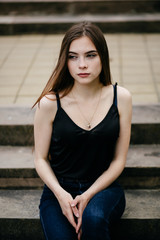 Fototapeta premium young girl posing on a street in the city