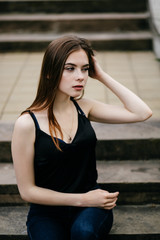 Fototapeta premium young girl posing on a street in the city