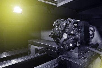 CNC turret head in black for setting various drill bits. Close-up © pridannikov