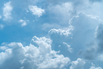 Naklejka na ściany i meble Blue sky and white clouds background.