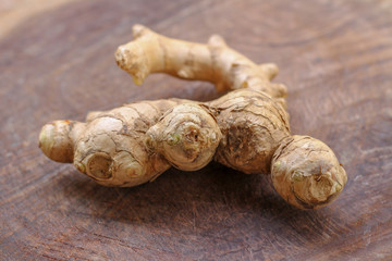 Ginger root  on wooden background