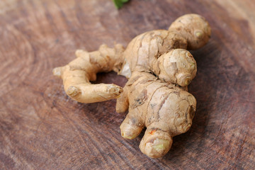 Ginger root  on wooden background