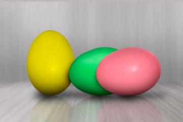 colorful easter eggs on green background