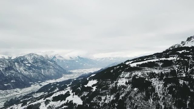 Aerial flight over beautiful mountains. Alpine mountain. Flums, Switzerland.