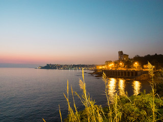 Naklejka premium view of the Ligurian sea, calm and at night, Quarto dei Mille area, one of the most beautiful places in Liguria