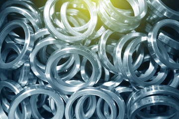 Round rings with internal thread for valve manufacture in the factory. Many round rings for industrial valve manufacturing. Texture