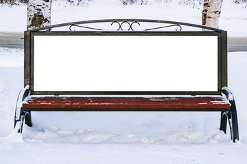 The layout of the city poster in winter in the snow, blank white Billboard on the bench, blank placeholder street information with a copy of the space for the logo