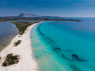 Fototapeta na wymiar Aerial view of La Cinta beach in Sardinia with turquoise sea