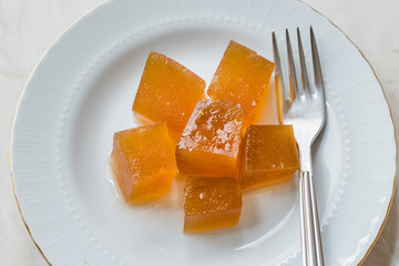 Turkish Crispy Pumpkin Dessert from Hatay / Kirecte Kabak Tatlisi with Walnut Powder.