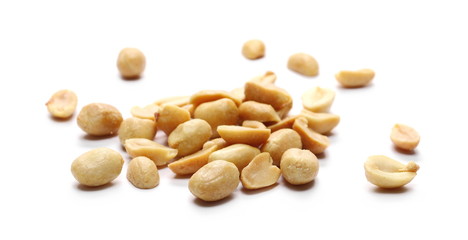 Salted and fried, roasted peanuts, pile isolated on white