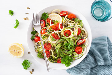 vegan ketogenic spiralized courgette salad with avocado tomato pumpkin seeds