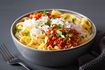 tagliatelle bolognese with herbs and parmesan, italian pasta