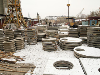 Factory warehouse of reinforced concrete products. Industrial production for the manufacture of building structures.