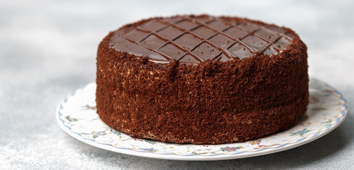 Homemade delicious chocolate cake. Tasty treat in tea or coffee. Dessert for gourmets.  Selective focus