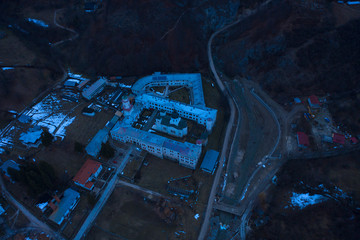 Monastery Bistrita Valcea aerial view by night