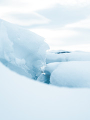 Fototapeta na wymiar Broken ice on a lake in Norway
