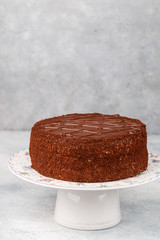 Homemade delicious chocolate cake. Tasty treat in tea or coffee. Dessert for gourmets.  Selective focus