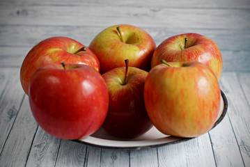  Red apples on white background