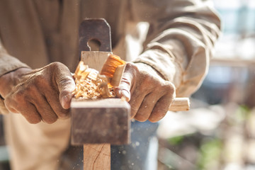 .In the hands of a carpenter there is spokeshave.