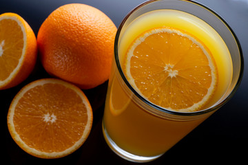  fruit, orange juice in a glass