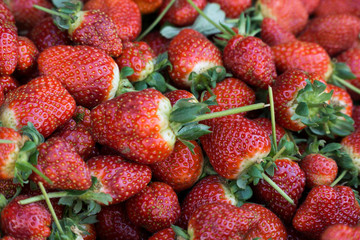 As shot fresh strawberry photo at market place