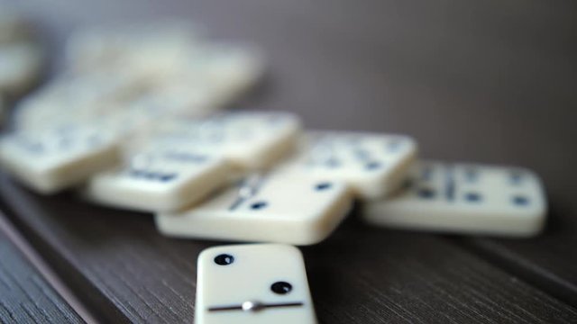 Falling Row of Domino Tiles in Slow Motion