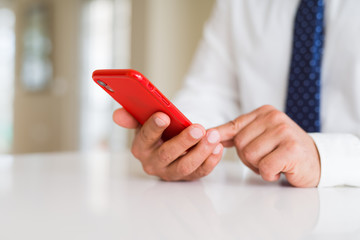 Close up of business man hands using smarpthone