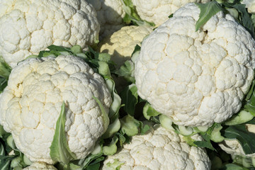 As shot fresh cauliflower photo at market place