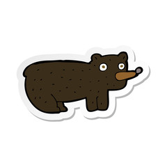 sticker of a funny cartoon black bear