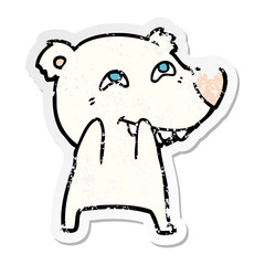 distressed sticker of a cartoon polar bear showing teeth