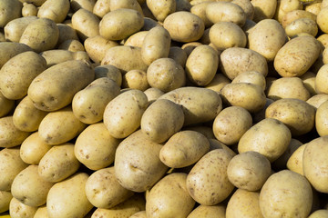 As shot fresh potato photo at market place