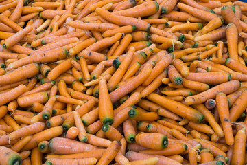 As shot fresh carrots photo at market place