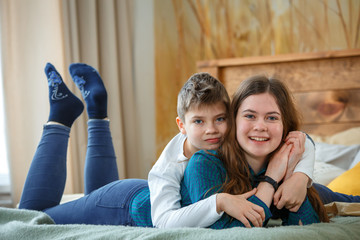Photo session - friendly family. Brother and sister.