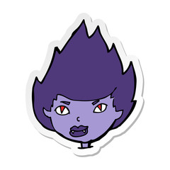 sticker of a cartoon vampire head