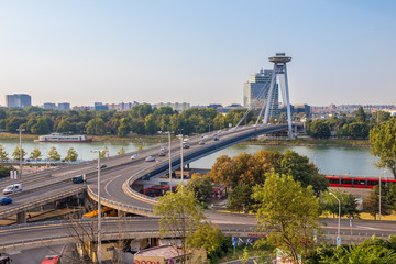 BRATISLAVA, SLOVAKIA - AUGUST 20 2018: Morning traffic on the SNP bridge in the center of Bratislava, the capital of Slovak Republic