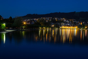 Lake of Zug city in Switzerland at night in summer